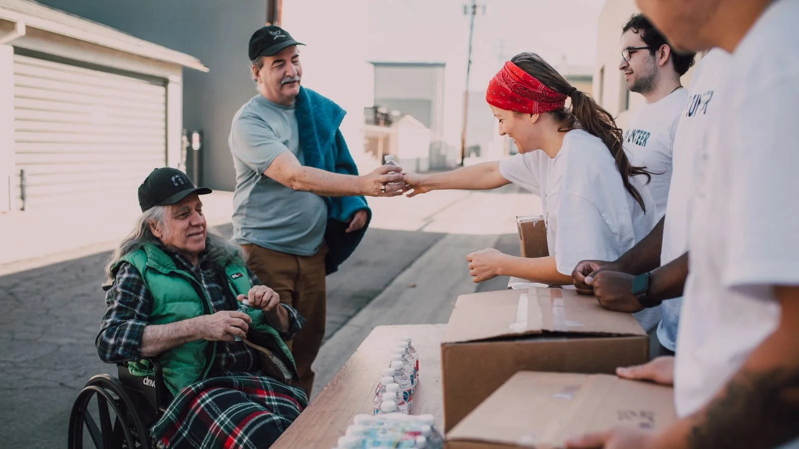 Volunteers delivering donations during a shared community effort